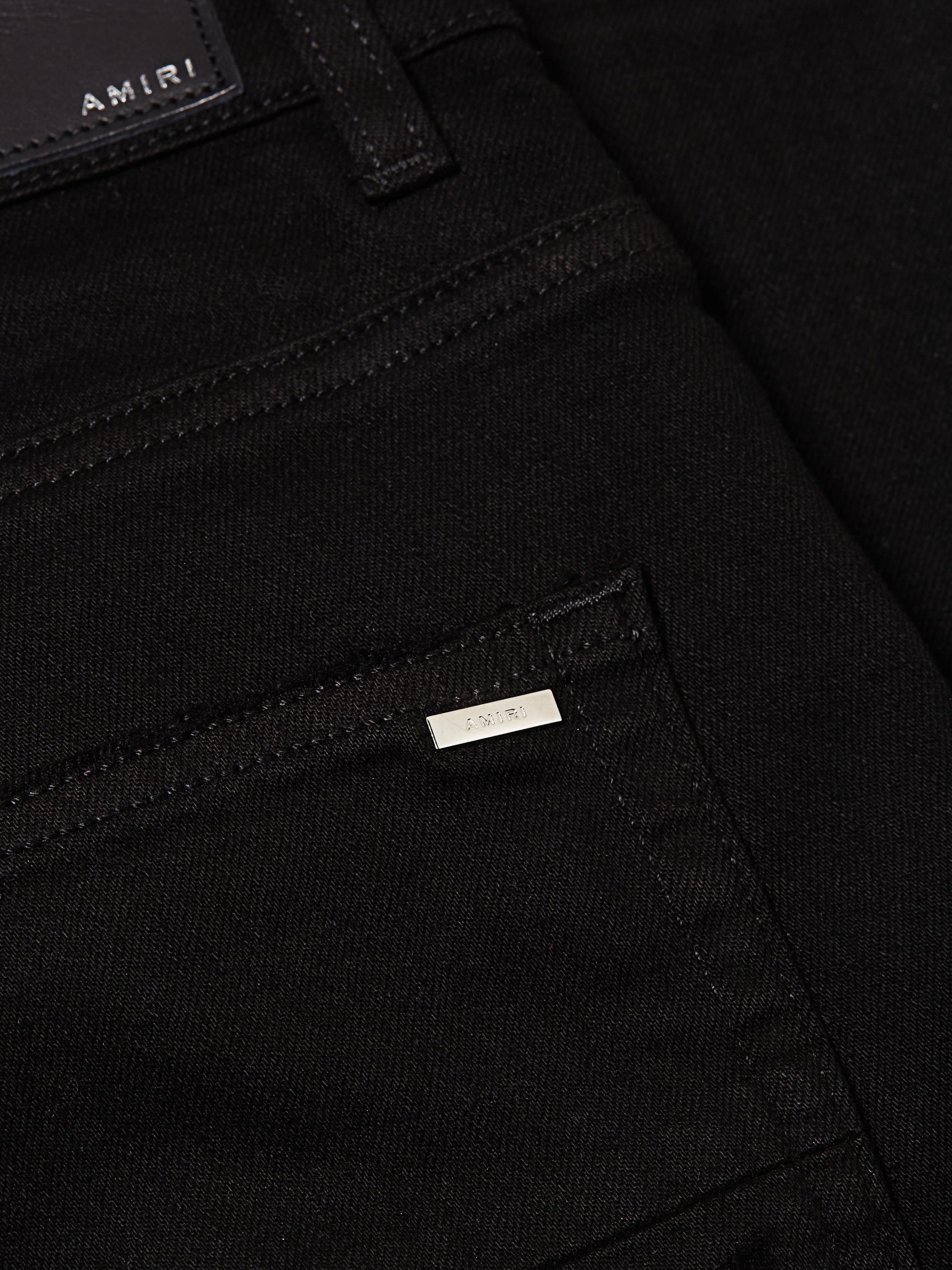 Amiri MX1 Distressed Skinny Jeans | Saks Fifth Avenue