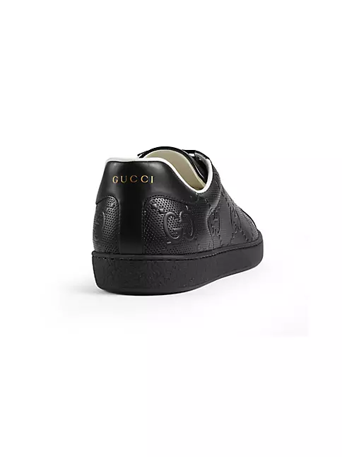 Gucci Monogram Embossed Sneakers in Black for Men