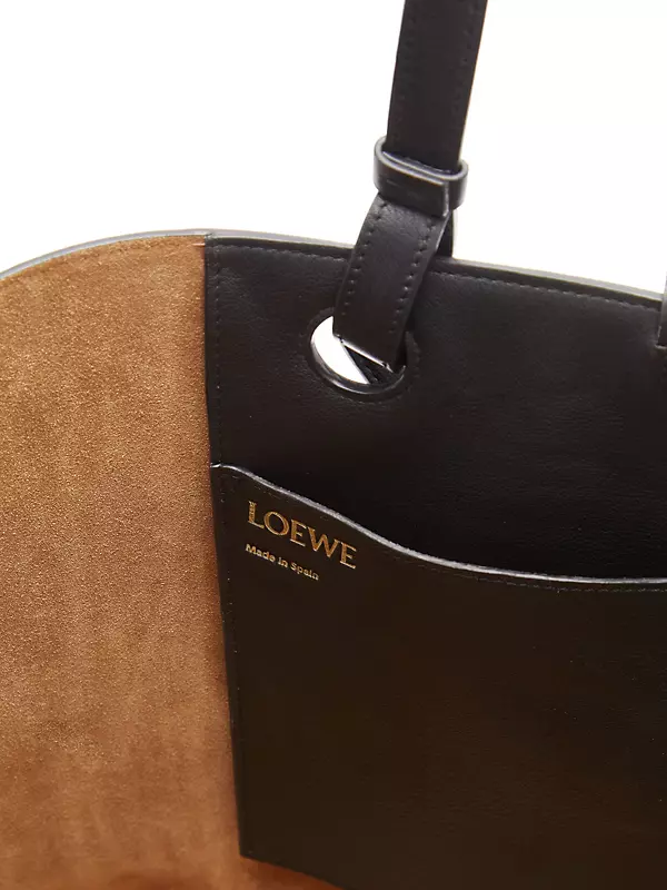 LOEWE - The LOEWE Anagram collection, including Balloon bag, Cushion tote  and Gate Bucket Handle bag, is crafted in linen and leather. Now available  on loewe.cm/fw20_anagram #LOEWE #LOEWEFW20