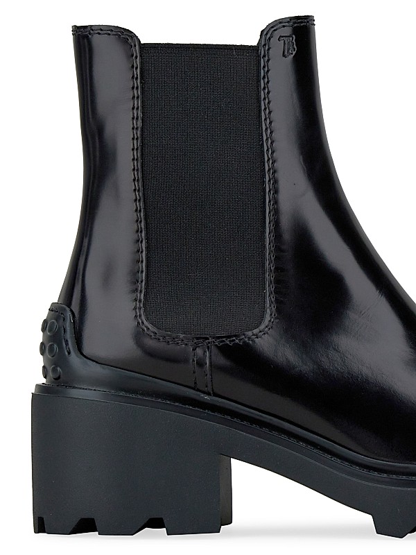 Shop Tod's Patent Leather Lug-Sole Chelsea Boots | Saks Shop Tod's Patent Leather Lug-Sole Chelsea Boots | Saks