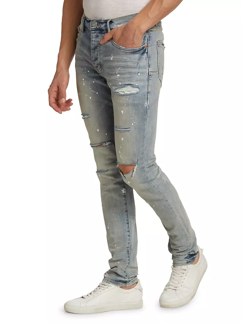 P001 Paint Splatter Distressed Skinny Jeans