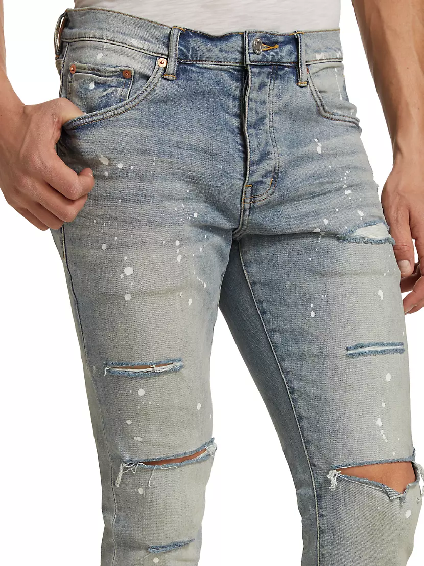 P001 Paint Splatter Distressed Skinny Jeans