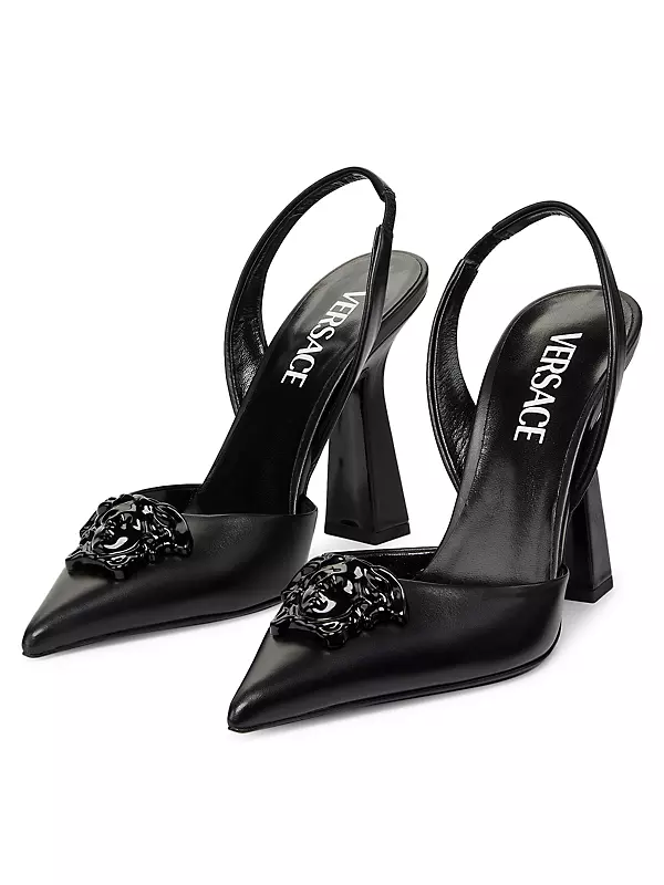 Medusa embellished leather pumps in black - Versace