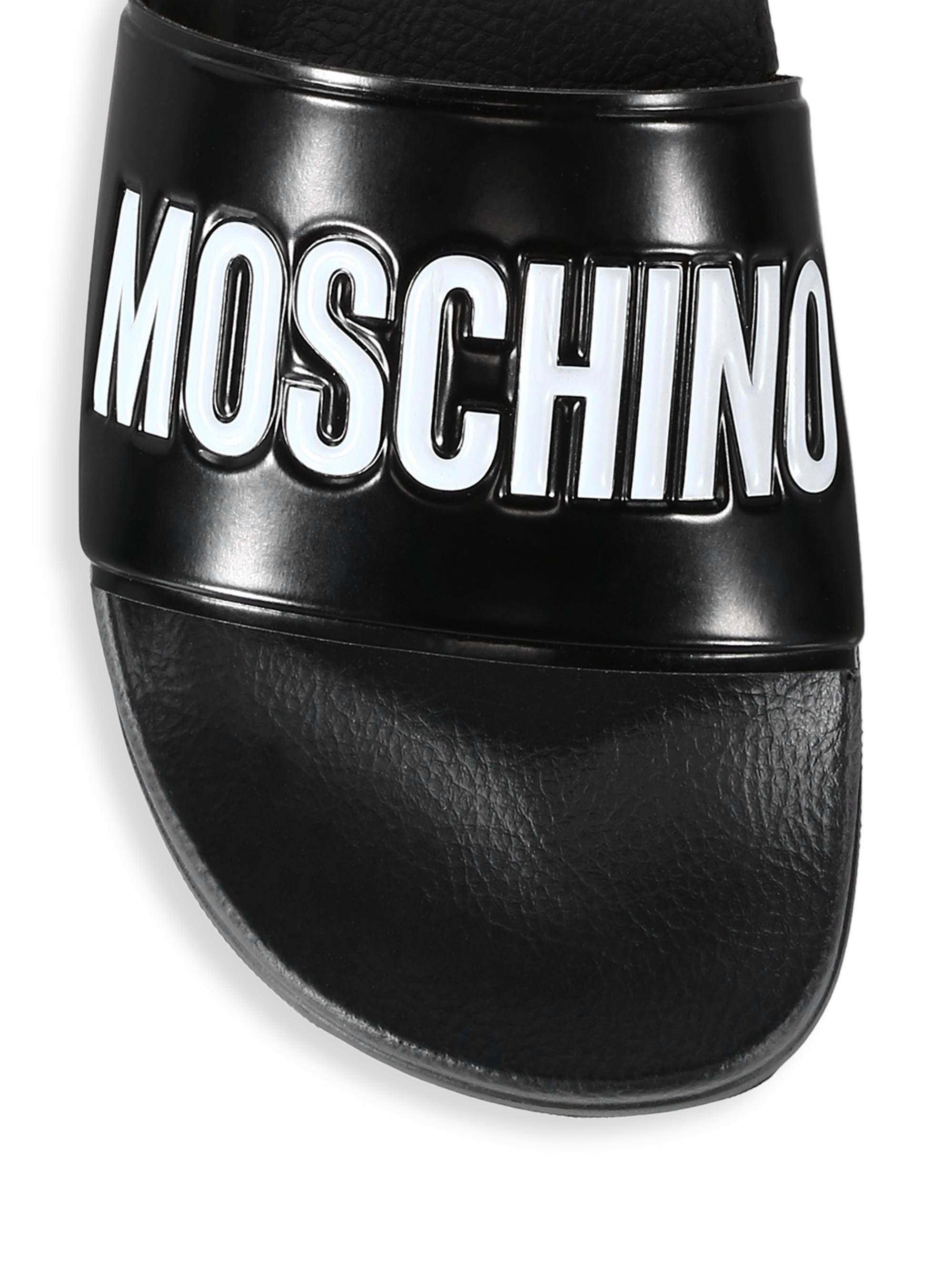 Moschino Mule PVC Logo Pool Slides | Saks Fifth Avenue display picture 1