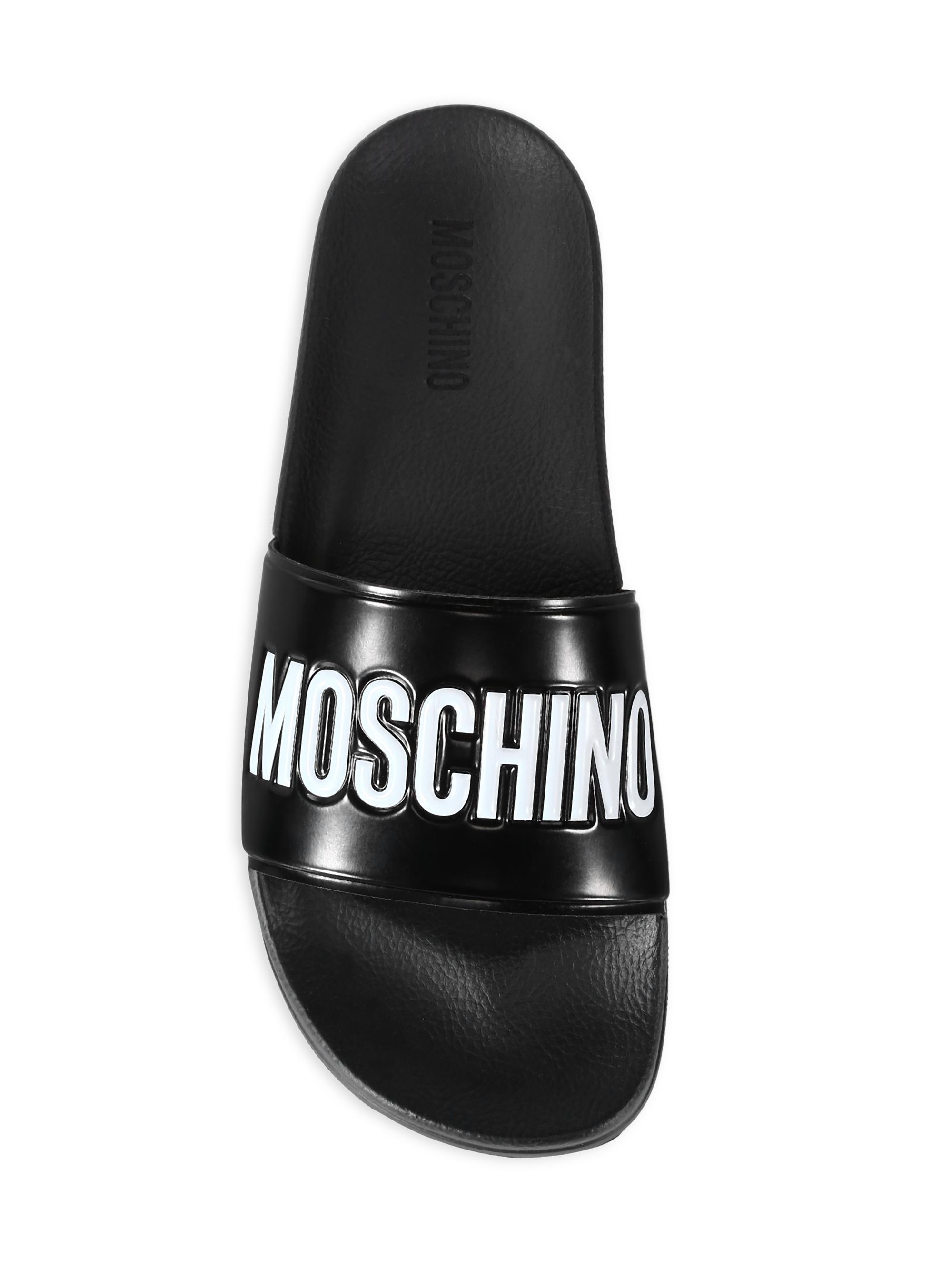 Moschino-Mule PVC Logo Pool Slides in Black Moschino Mule PVC Logo Pool Slides | Saks Fifth Avenue main image 4