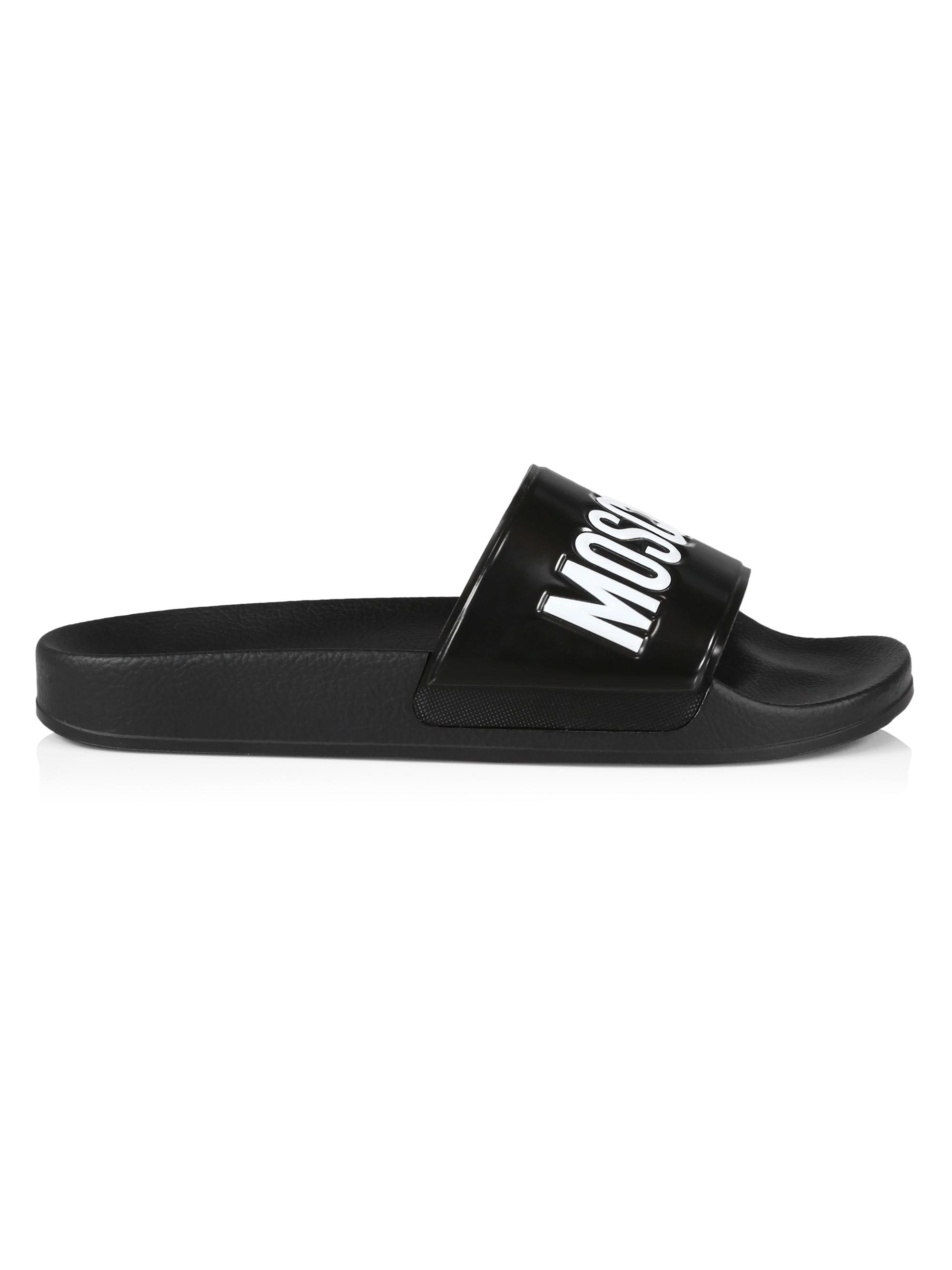 Moschino-Mule PVC Logo Pool Slides in Black Moschino Mule PVC Logo Pool Slides | Saks Fifth Avenue main image 3