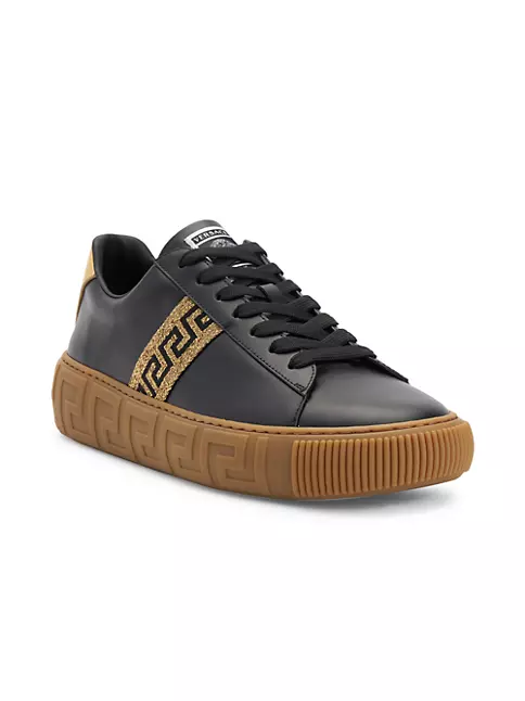 Shop Versace La Greca Leather Low-Top Sneakers