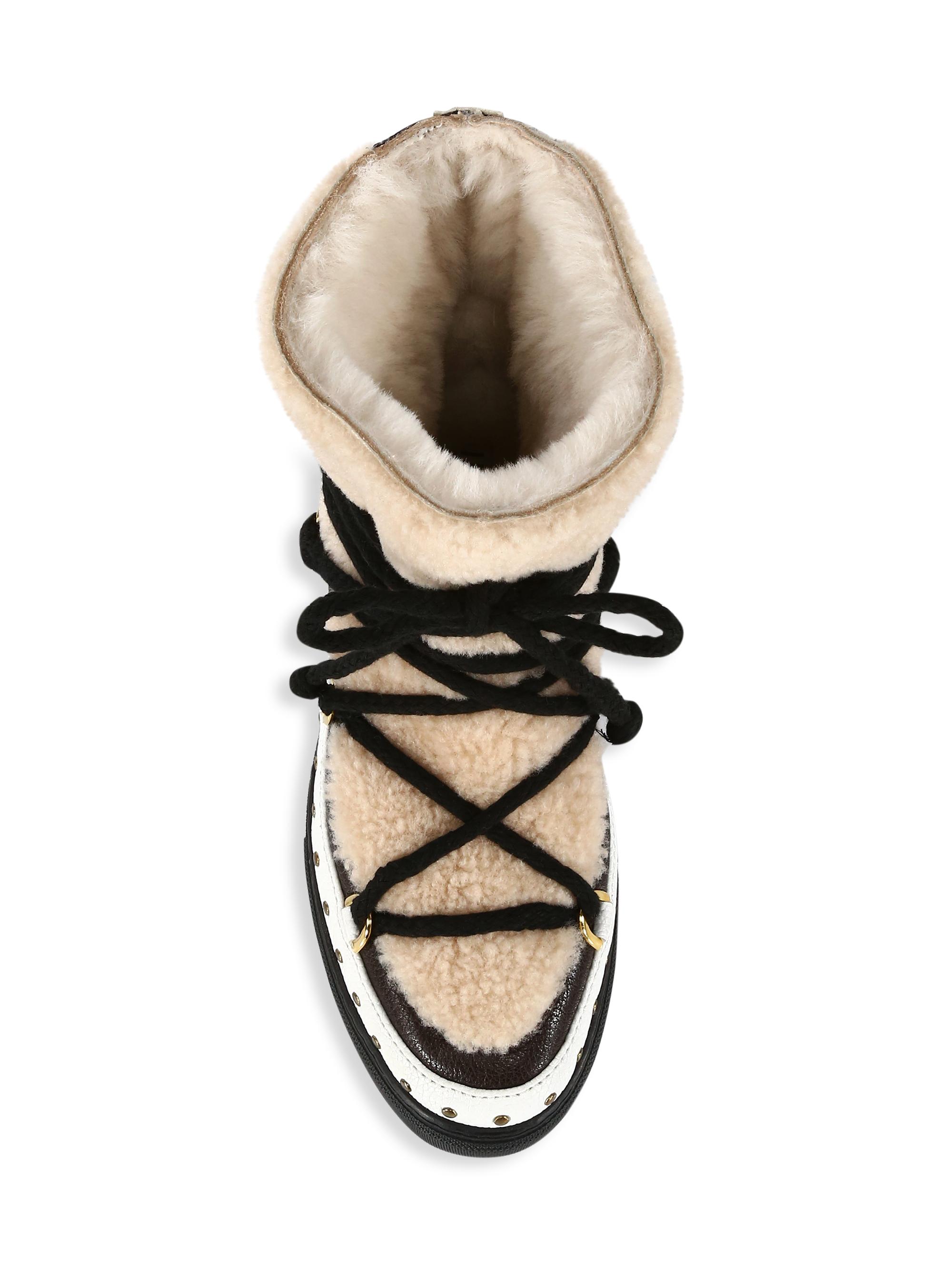inuikii curly rock shearling sneaker boots