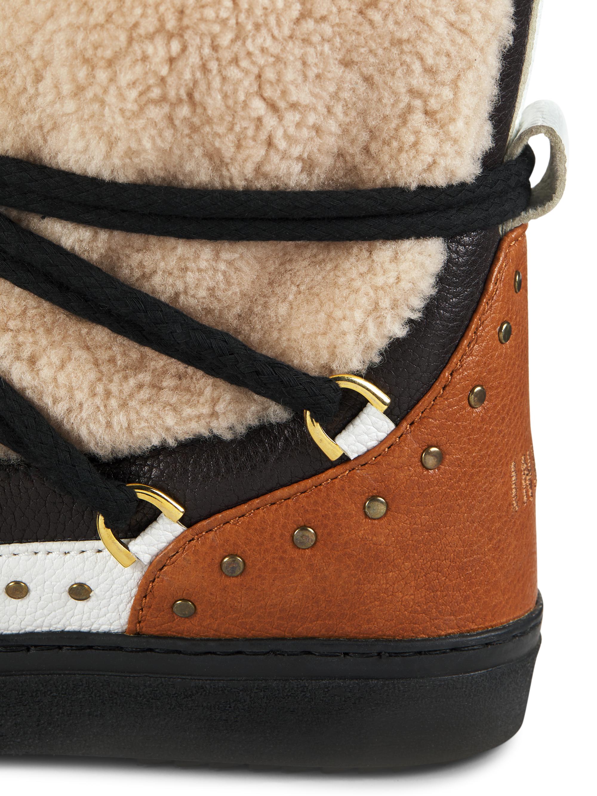 inuikii curly shearling sneaker boots
