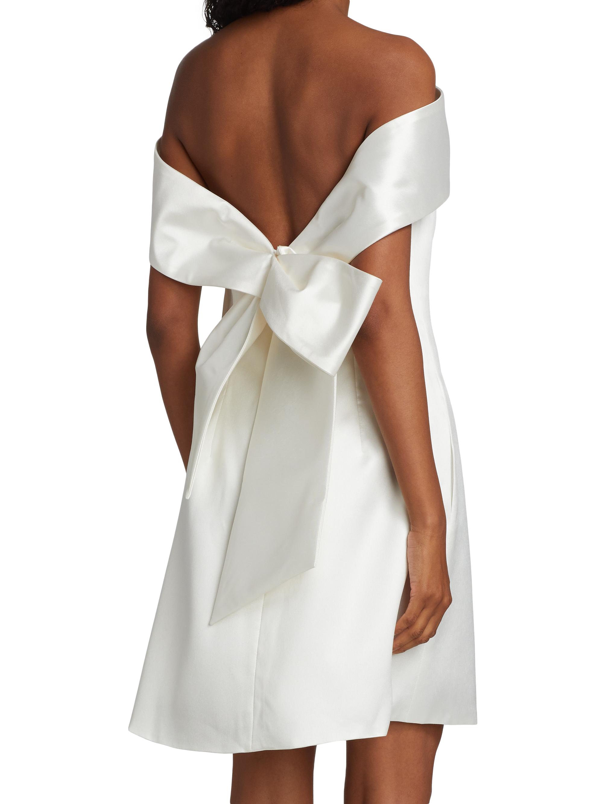 white off the shoulder peplum dress Raquel Babydoll Corset Mini Dress