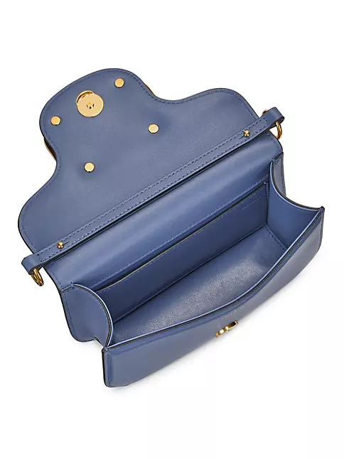Valentino Garavani mini Locò leather crossbody bag - ShopStyle