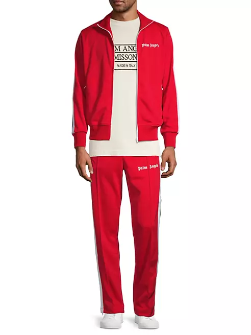 PALM ANGELS: jogging trousers with all over logo - Red