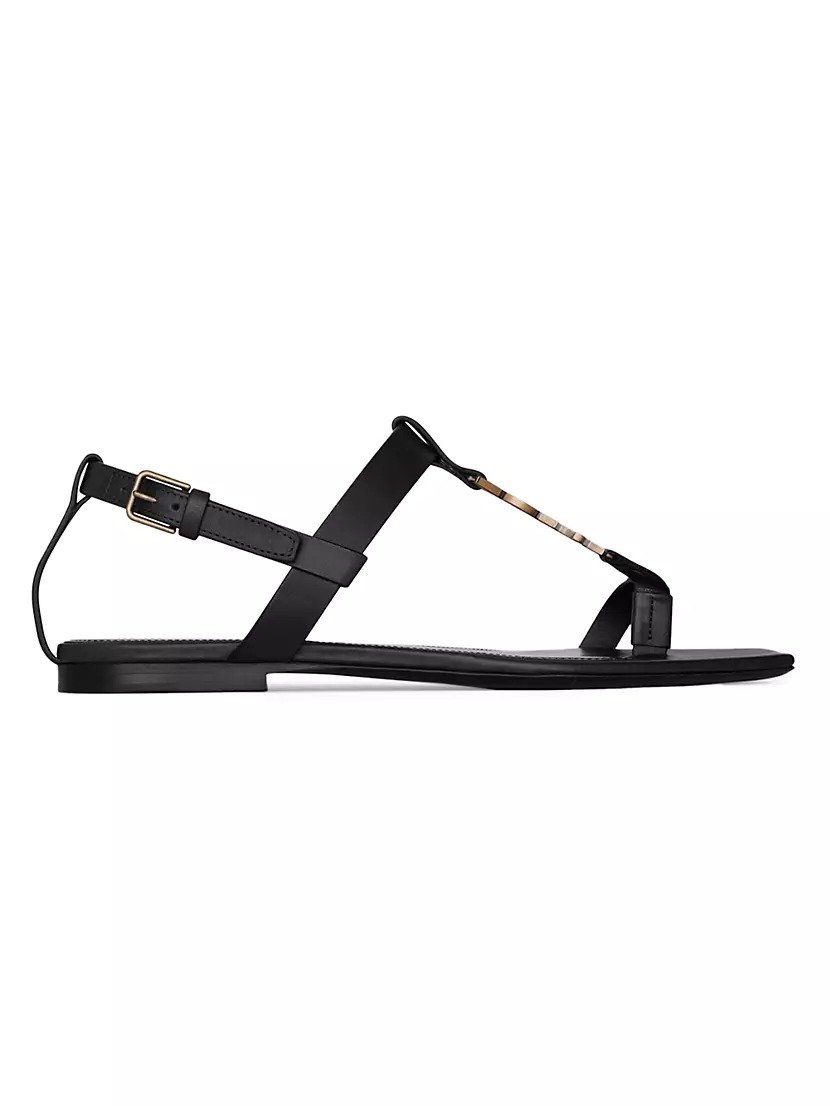 Shop Saint Laurent Cassandra Flat Sandals In Smooth Leather With Gold-tone  Monogram