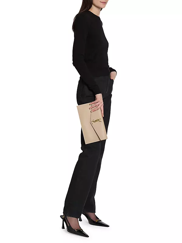 SAINT LAURENT Uptown textured-leather pouch  Beige clutches, Clutch bag  outfit, Ysl clutch