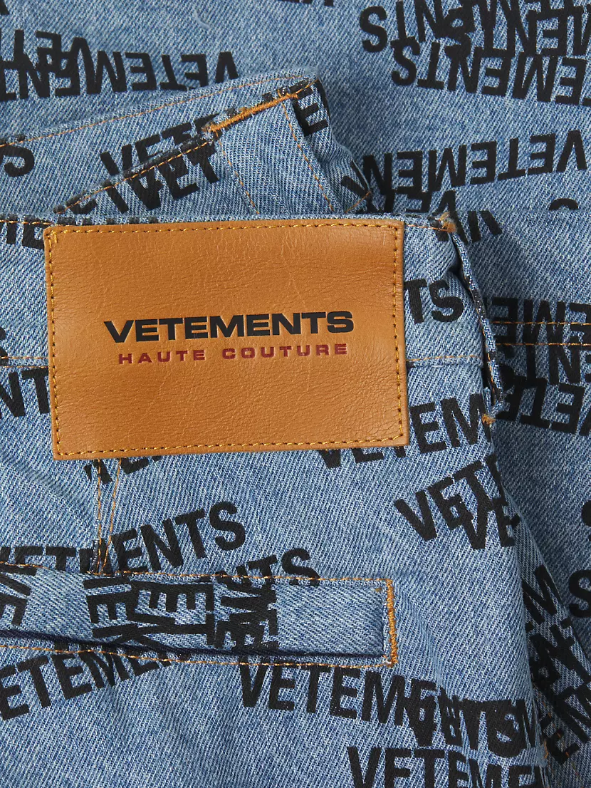 Shop Vetements Stamped Logo Baggy Transformer Jeans | Saks Fifth 