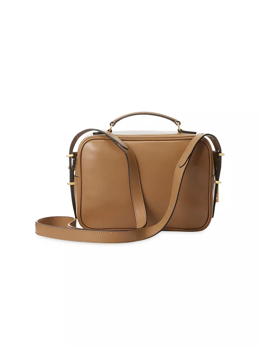 Past auction: Tan leather Courrèges camera bag style purse