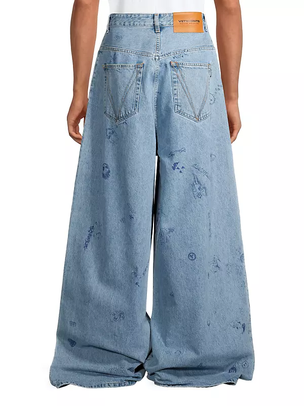 Shop Vetements Scribbled Baggy Jeans | Saks Fifth Avenue