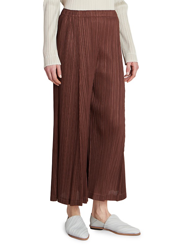 Shop Pleats Please Issey Miyake Pleated Wide-Leg Pants Shop Pleats Please Issey Miyake Pleated Wide-Leg Pants