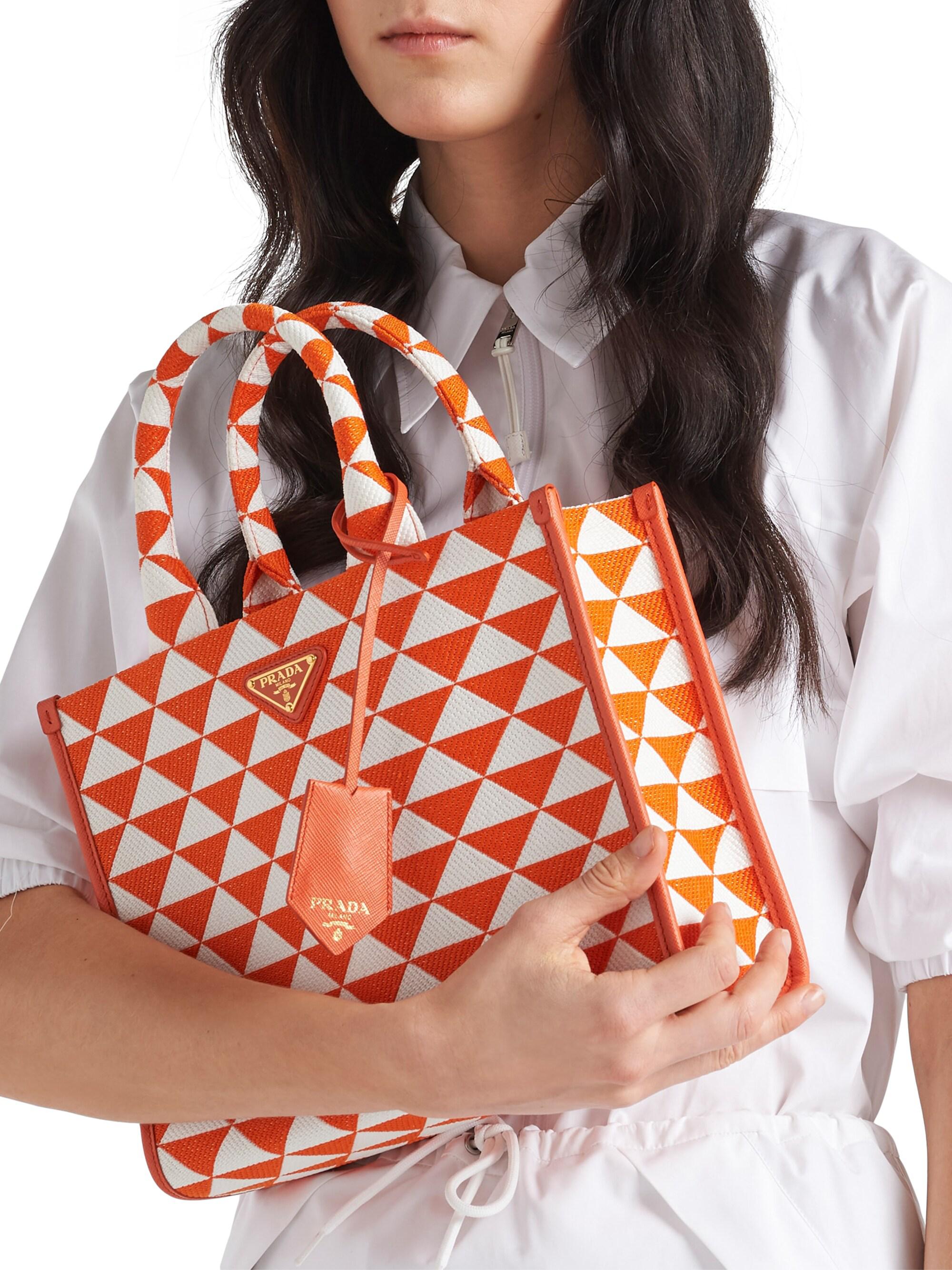 Prada Women's  Symbole Embroidered Fabric Handbag - Beige