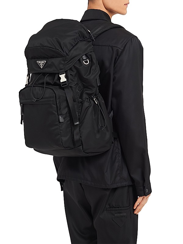 Shop Prada Re-Nylon and Saffiano Leather Backpack | Saks Shop Prada Re-Nylon and Saffiano Leather Backpack | Saks