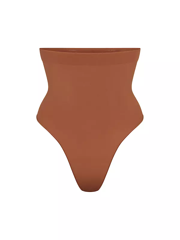 Kim Kardashian - The SKIMS Core Control Thong ($24) - available now in  select sizes in Clay, Sienna, Umber, and Onyx at SKIMS.COM. Shop now before  they sell out and receive free