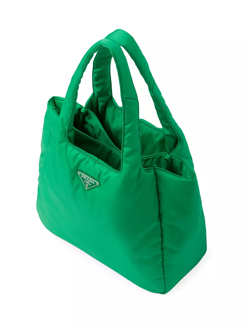 Shop PRADA Padded re-nylon tote bag (1BG421_RUKW_F0002_V_OOO) by