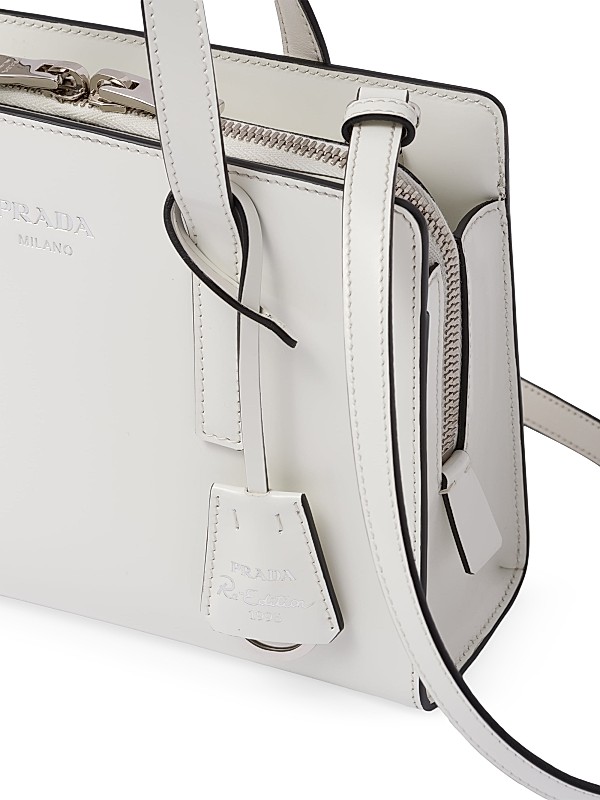 Shop Prada Re-Edition 1995 Brushed Leather Mini Handbag Shop Prada Re-Edition 1995 Brushed Leather Mini Handbag