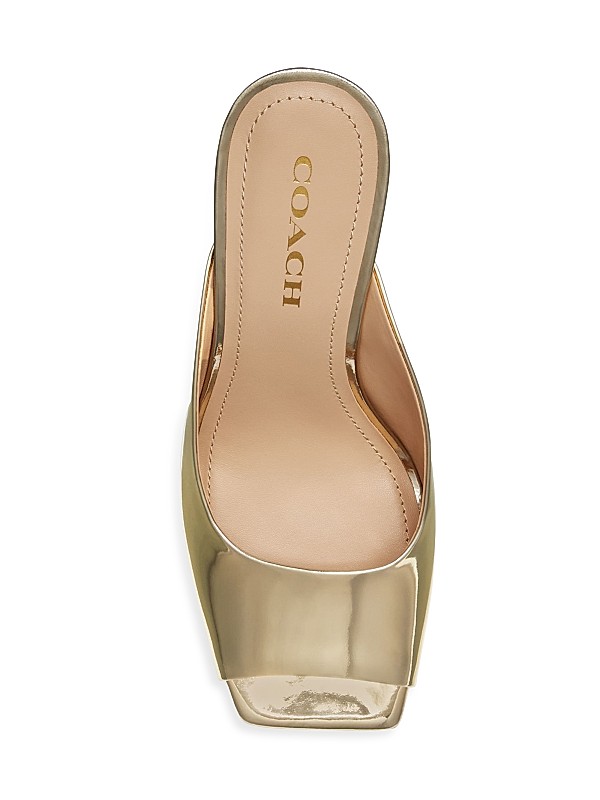 Shop COACH Laurence 90MM Metallic Leather Sandals | Saks Shop COACH Laurence 90MM Metallic Leather Sandals | Saks