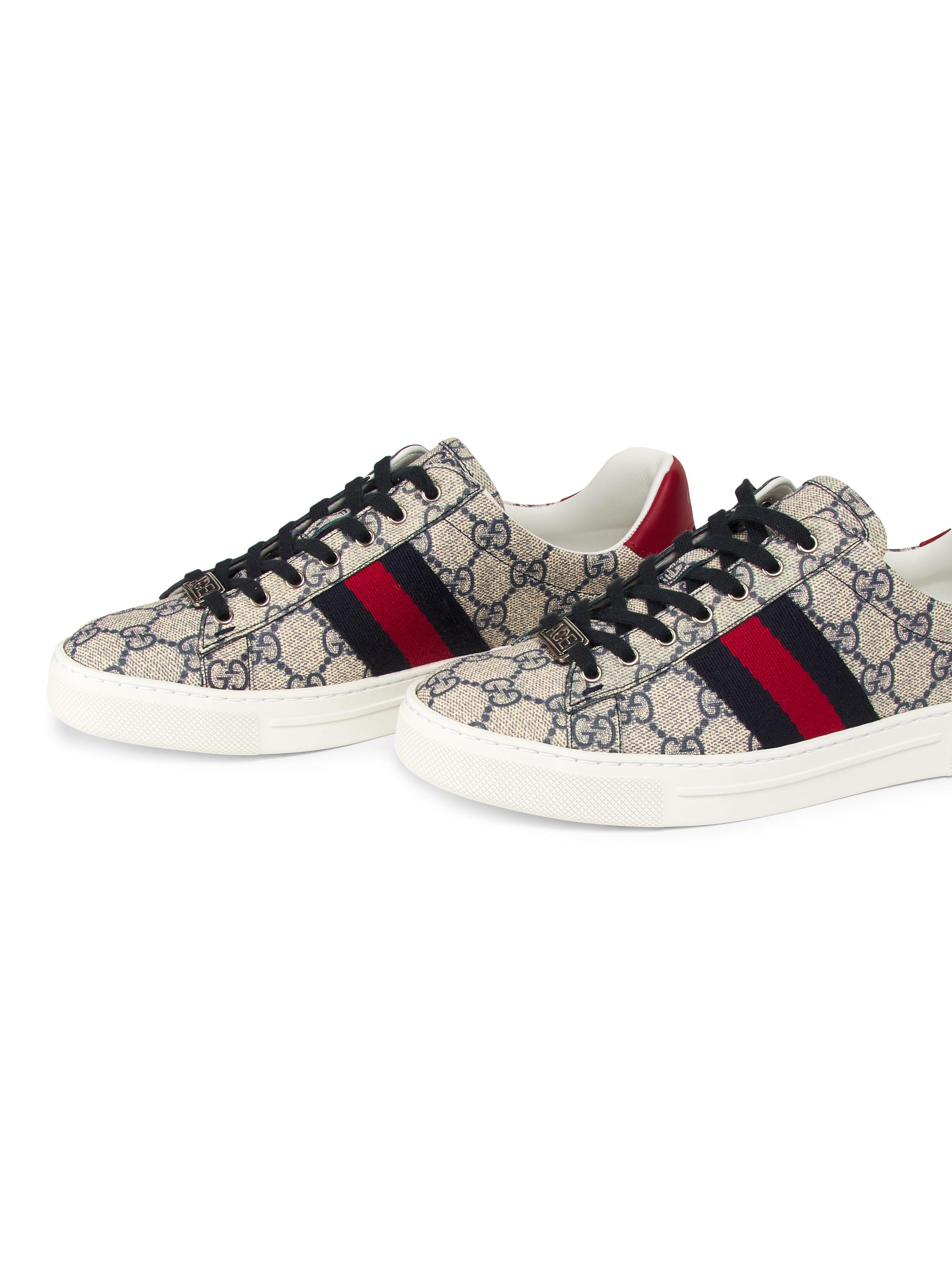 Gucci Women's Ace Monogram Sneakers - Blue Midnight - back view in Blue midnight