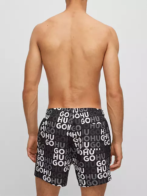 All-over logo print swim trunks