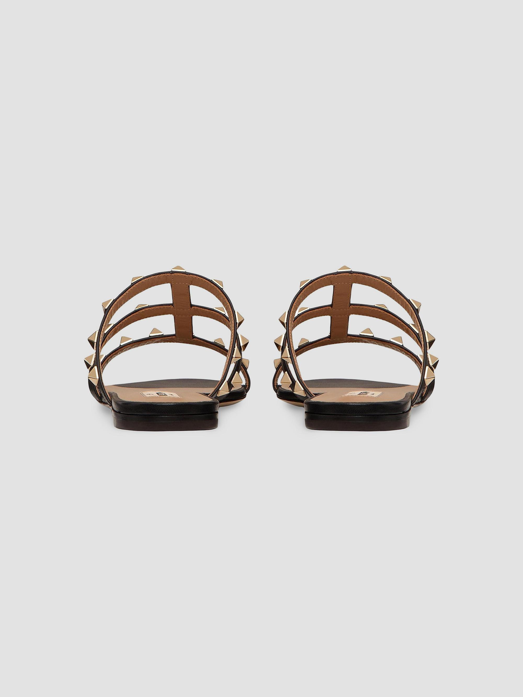 Valentino Garavani Rockstud Flat Slide Sandals | Saks Fifth Avenue