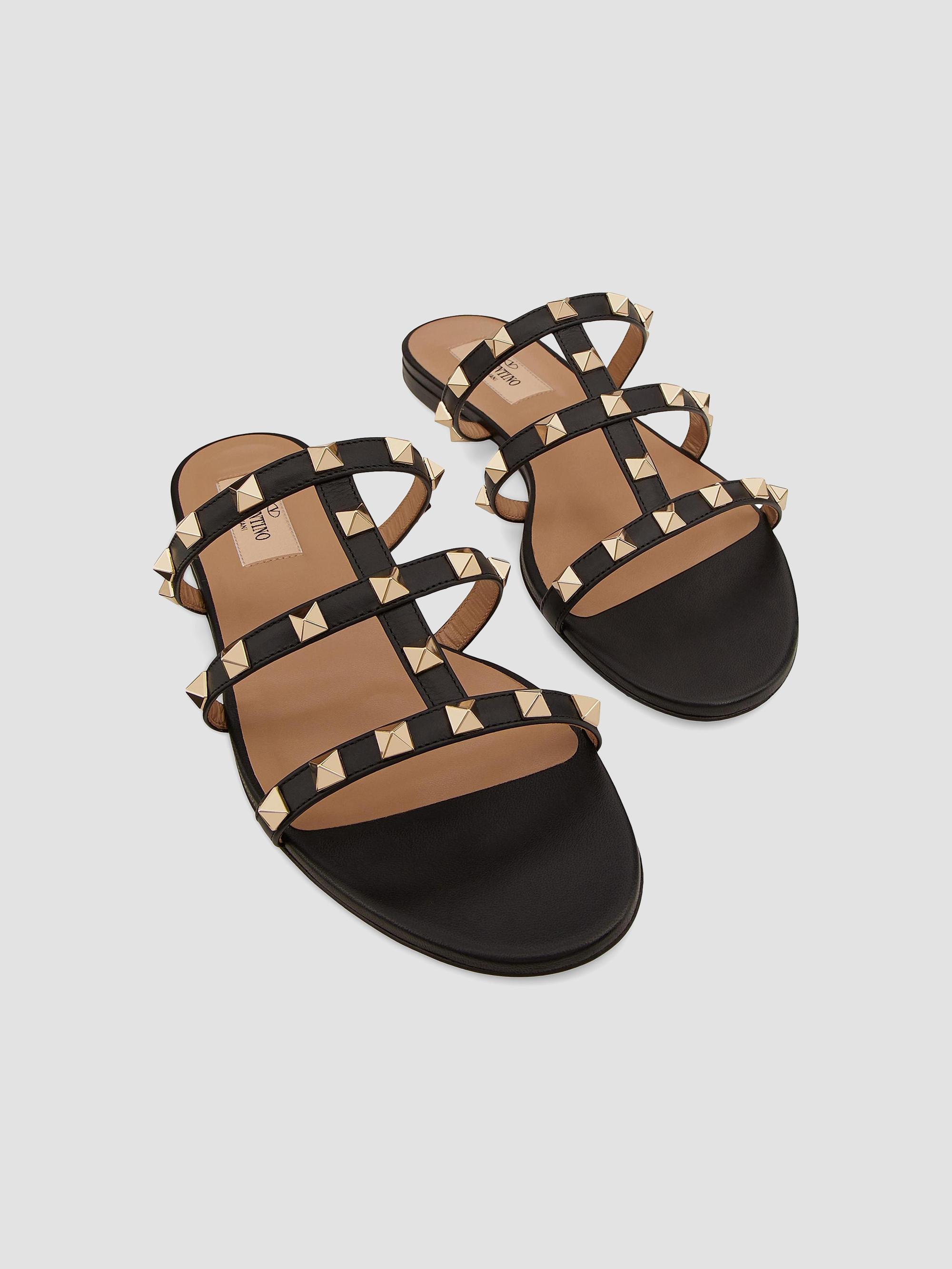 Valentino Garavani Rockstud Flat Slide Sandals | Saks Fifth Avenue