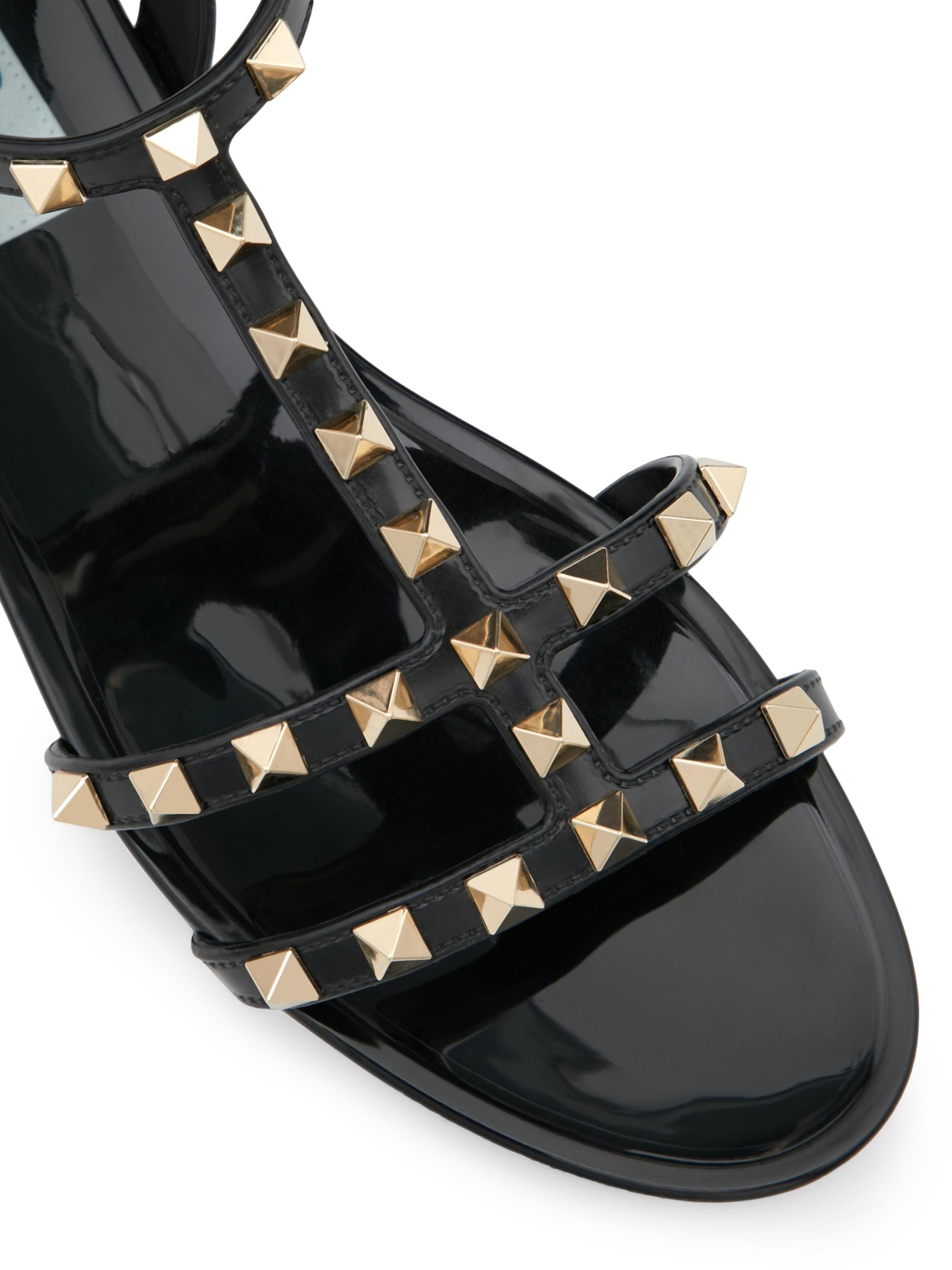 Valentino Garavani Rockstud Flat Rubber Sandals | Saks Fifth