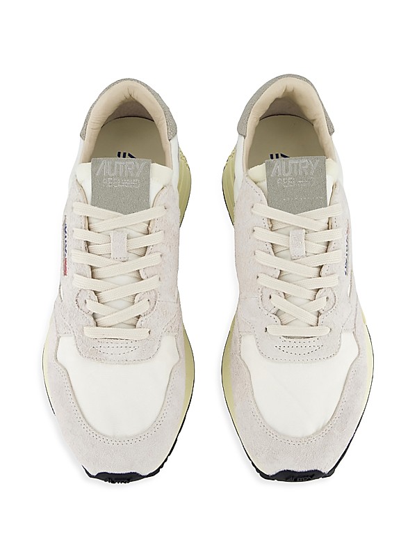 Shop Autry Whirlwind Runner Leather Low-Top Sneakers | Saks Shop Autry Whirlwind Runner Leather Low-Top Sneakers | Saks