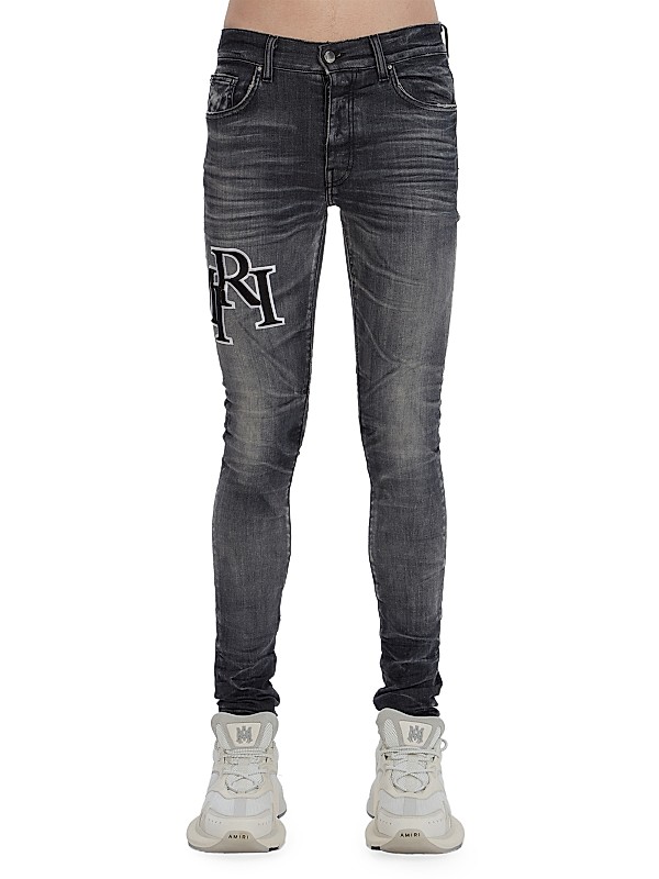 Shop Amiri Staggered Logo Skinny Jeans | Saks Fifth Avenue Shop Amiri Staggered Logo Skinny Jeans | Saks Fifth Avenue