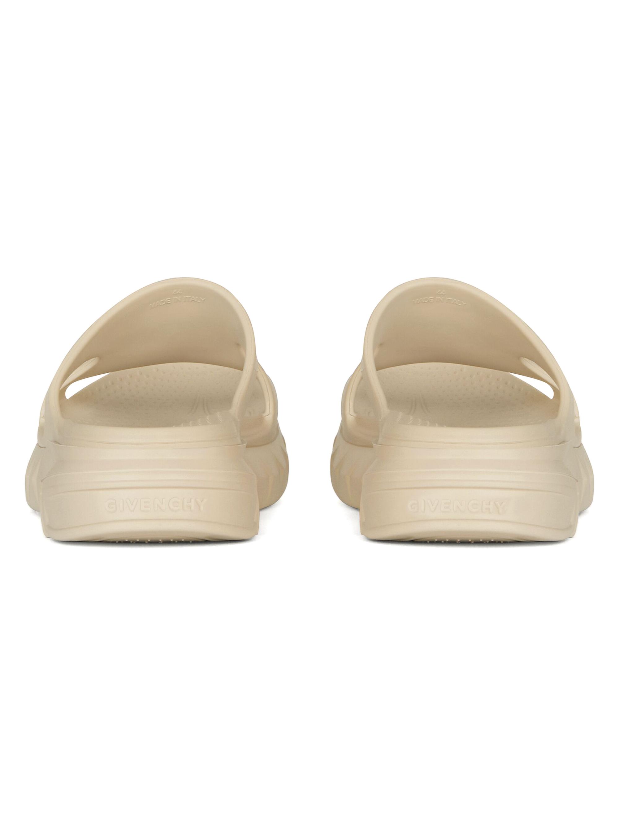 Shop Givenchy Marshmallow Flat Sandals in Rubber | Saks Fifth Avenue 
