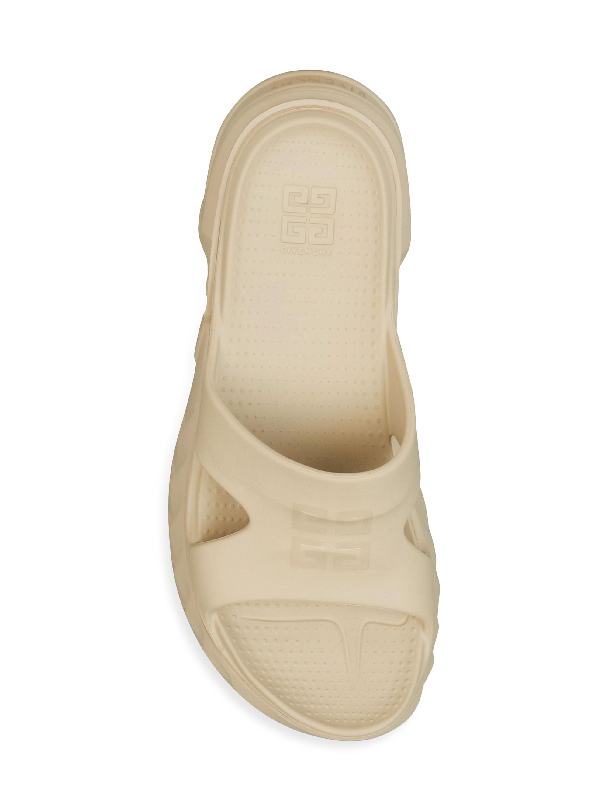 Shop Givenchy Marshmallow Flat Sandals in Rubber | Saks Fifth Avenue 