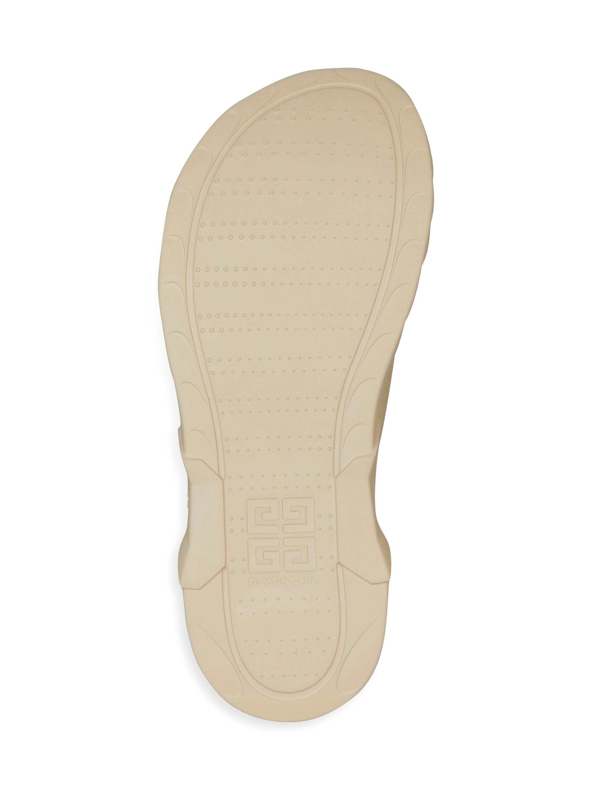 Shop Givenchy Marshmallow Flat Sandals in Rubber | Saks Fifth Avenue 