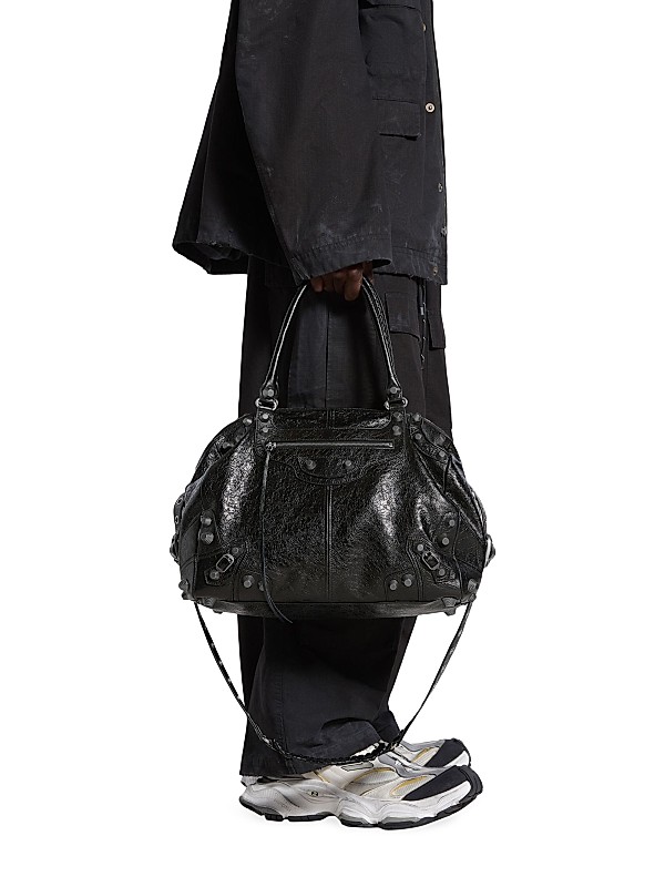 Shop Balenciaga Le Cagole Medium Duffle Bag | Saks Fifth Avenue Shop Balenciaga Le Cagole Medium Duffle Bag | Saks Fifth Avenue