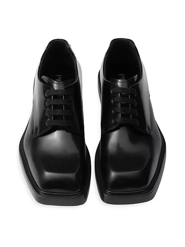 Shop Prada Brushed Leather Derby Shoes | Saks Fifth Avenue