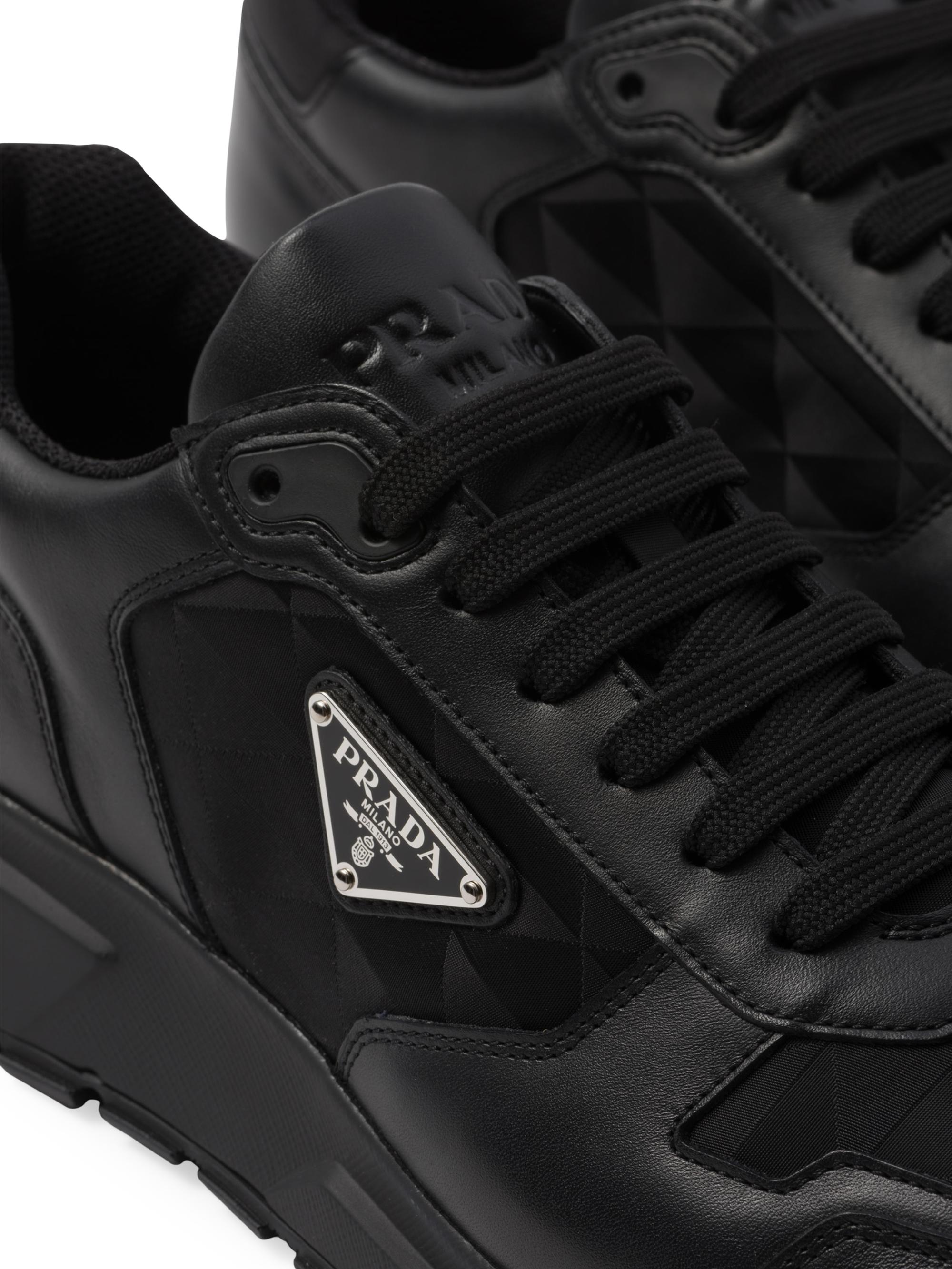 Prada Leather and Re-Nylon High-Top Sneakers | Saks Fifth Avenue