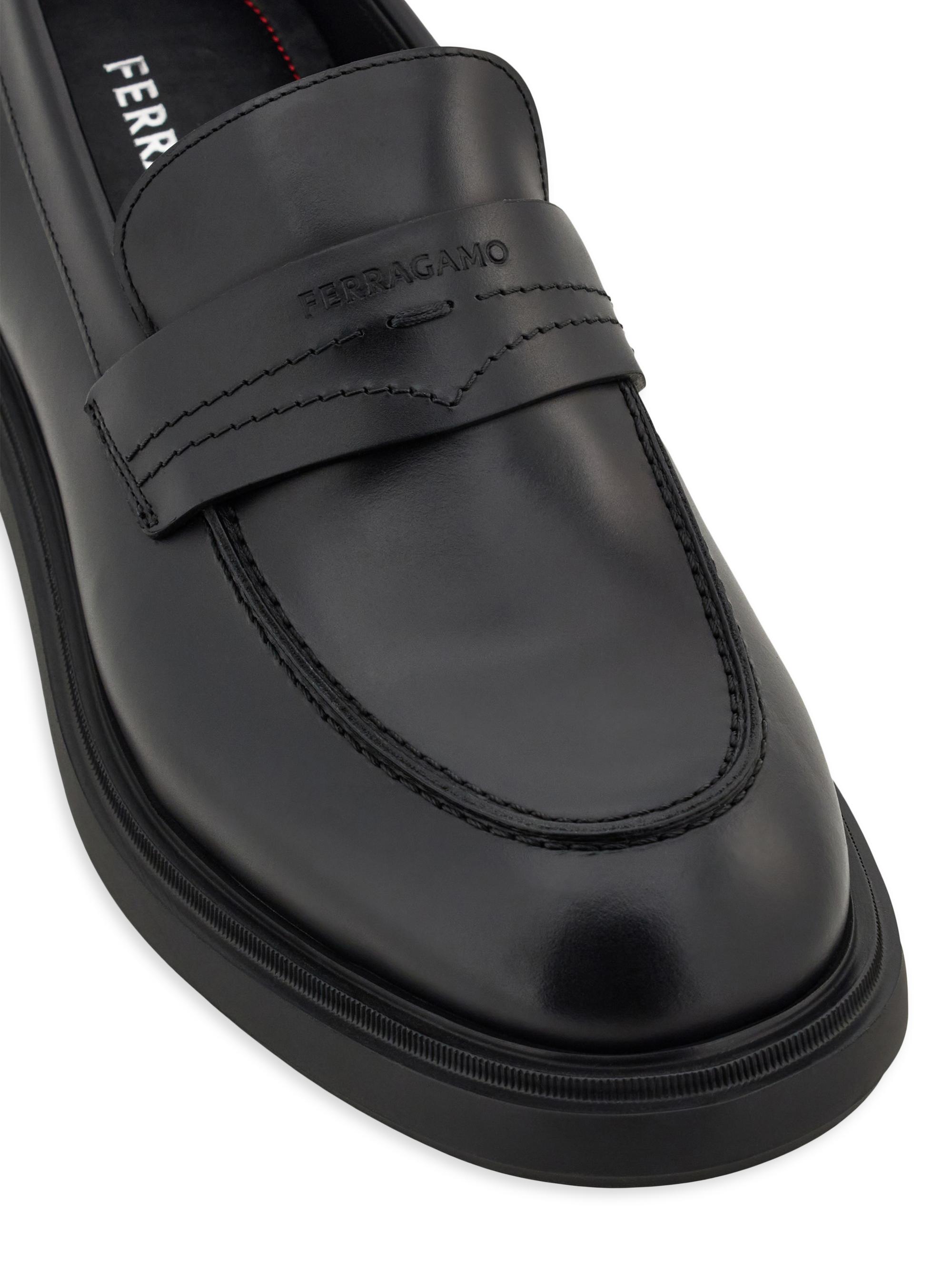 NEW SALVATORE FERRAGAMO men\'s caligola logo embossed slip-on loafers in black Shop Shoes Caligola type loafers on Sale at BeyondStyle  main image 4
