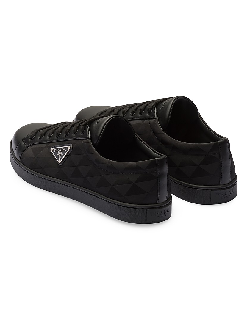 Shop Prada Leather and Re-Nylon Sneakers | Saks Fifth Avenue Shop Prada Leather and Re-Nylon Sneakers | Saks Fifth Avenue