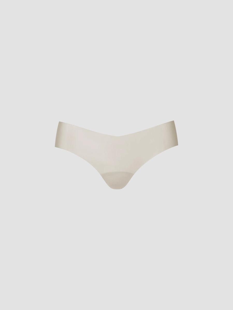 Commando Women's Invisible Rib Seamless Thong In Beige