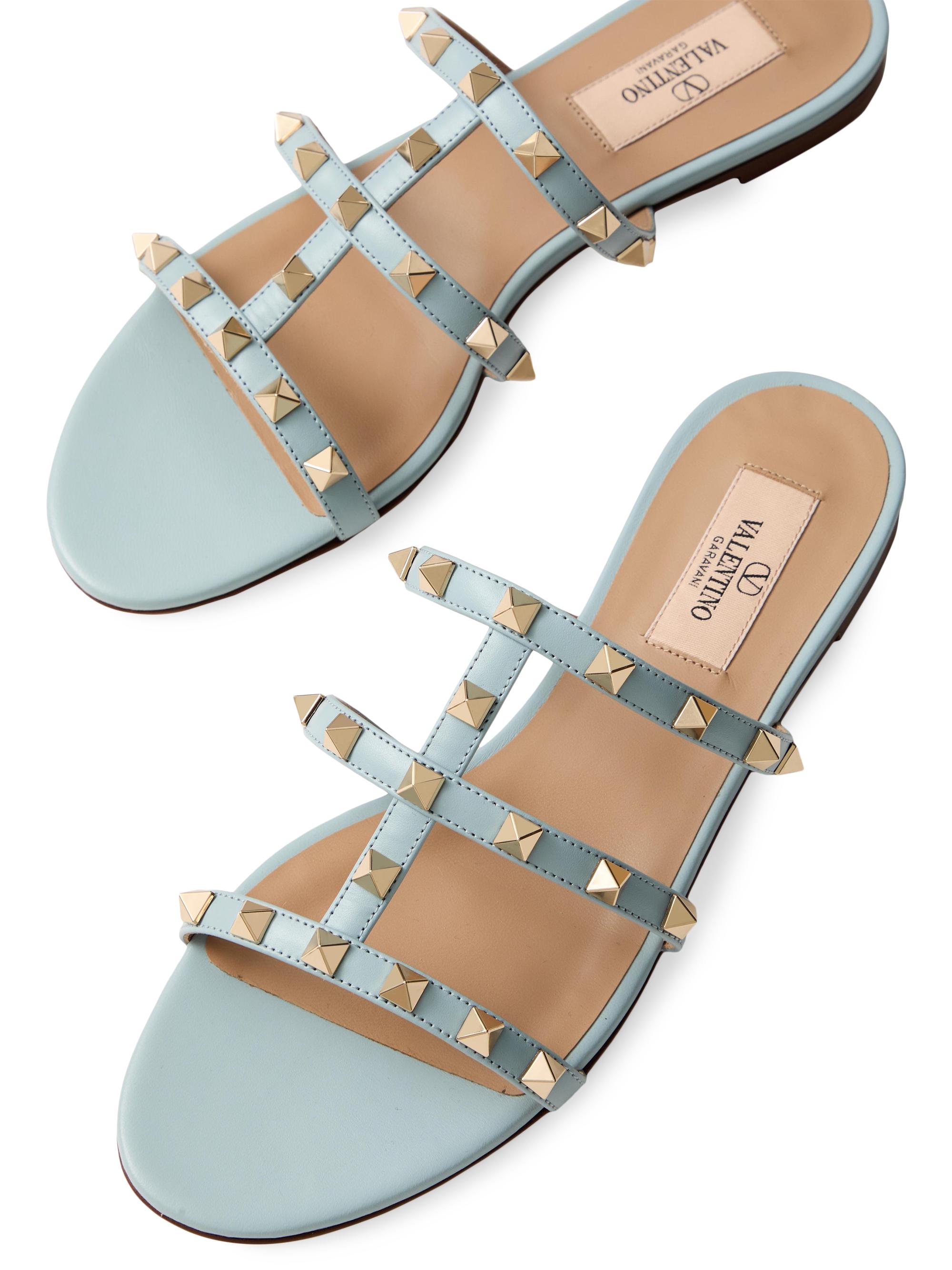 Shop Valentino Garavani Rockstud Flat Slide Sandals | Saks Fifth  