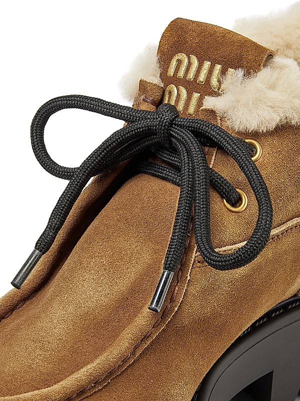 Shop Miu Miu Shearling Wallaby Leather Booties | Saks Fifth Shop Miu Miu Shearling Wallaby Leather Booties | Saks Fifth