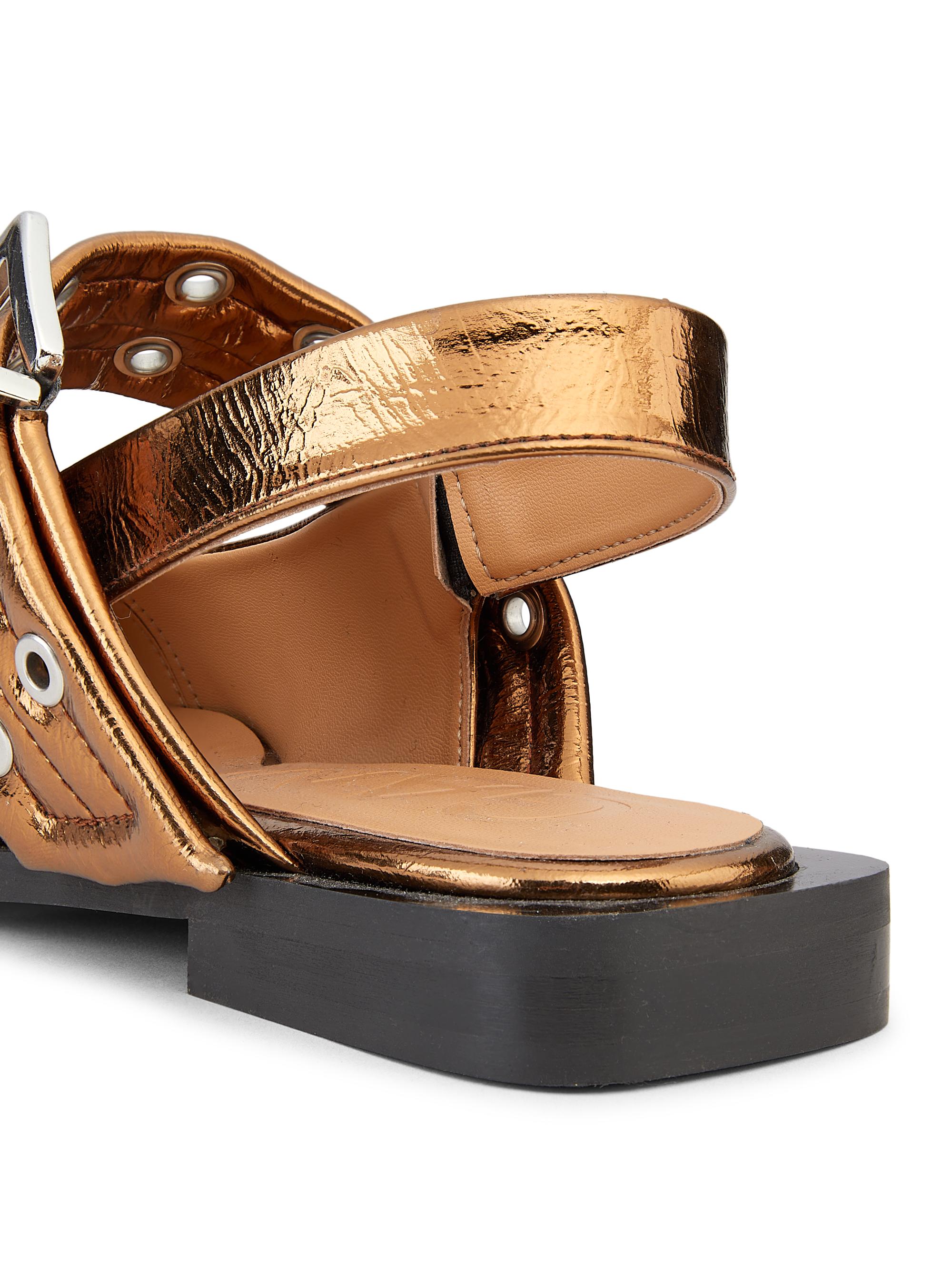 Ganni Women's Metallic Buckle Ballerina Flats - Bronze - side view in Bronze