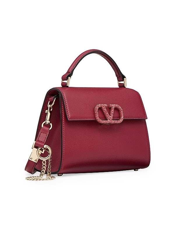 Shop Valentino Garavani VSling Mini Top Handbag with Logo Shop Valentino Garavani VSling Mini Top Handbag with Logo