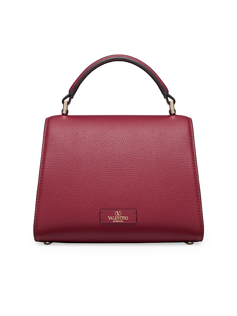 Shop Valentino Garavani VSling Mini Top Handbag with Logo Shop Valentino Garavani VSling Mini Top Handbag with Logo