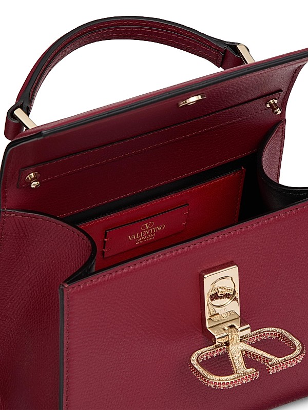 Shop Valentino Garavani VSling Mini Top Handbag with Logo Shop Valentino Garavani VSling Mini Top Handbag with Logo